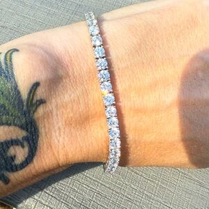 NIB Platinum Plated Sterling Swarovski 8” Tennis Bracelet 12 ct TW